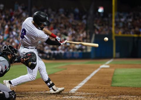 A player swings and hits the ball at a Winston-Salem Dash baseball game.