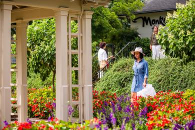 Three women walk around shopping at Reynolda Village in Winston-Salem.